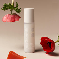 JustHuman 30 Sec Foot Facial bottle pour shows fast exfoliation for smoother feet.