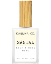 Kailuna Co. Santal mist bottle pour showcasing travel-friendly design for on-the-go scent