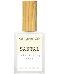 Kailuna Co. Santal mist bottle pour showcasing travel-friendly design for on-the-go scent