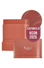 KAJA Dewy Bar Cranberry Cooler swatch on skin showing natural glow
