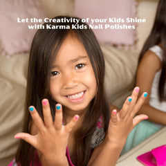Karma Organic Kids polish being applied on nail, gentle for children's nails.