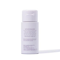 Karuna Hydrating Face Toner application on cheek demonstrating gentle exfoliation and balanced tone.