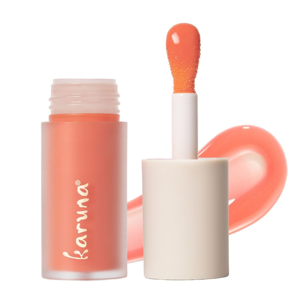 Karuna Tinted Lip Oil Pause packaging highlights clean beauty and on-the-go hydration.