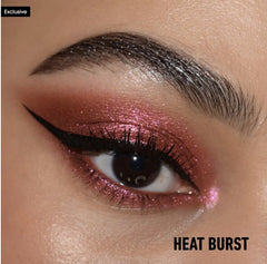 Kat Von D Dazzle Heat Burst cap twist reveals portable vegan long-wear design.
