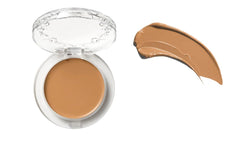 Kat Von D Good Apple Foundation Balm outer packaging shown as a sleek compact for on-the-go use