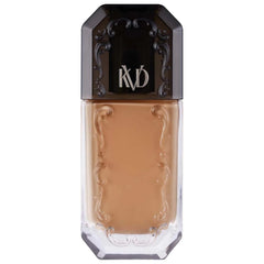 Kat Von D Good Apple Tan 074 bottle close-up for shade accuracy and branding