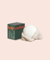 Kate McLeod Mama Stone baton-lotion, hydratation rapide et pratique.