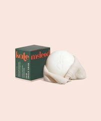 Kate McLeod Mama Stone baton-lotion, hydratation rapide et pratique.
