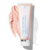 Kate Somerville EradiKate 3% Sulfur cleanser bottle in focus, medicated formula for clearer pores.