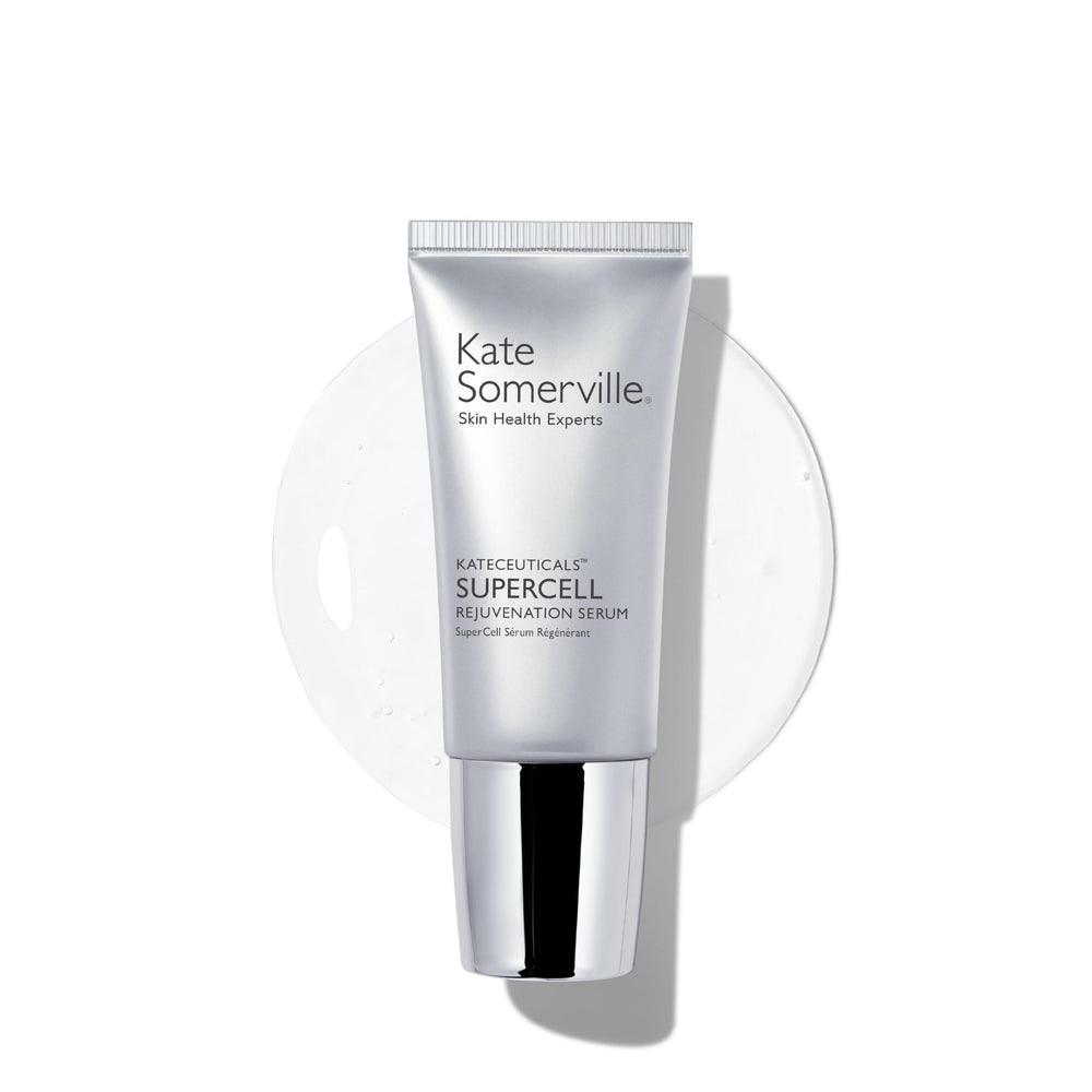 Kate Somerville SuperCell Serum bottle on vanity promotes radiant, healthy-looking skin.