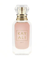 Kayali Huda Beauty Musk 12 bottle front view highlights warm florals and elegant design.