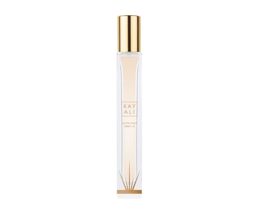 Kayali Invite Only Amber 23 travel spray bottle, portable luxury for evening wear