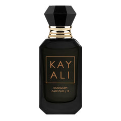 Kayali Oudgasm Café Oud travel spray bottle ready for on-the-go fragrance