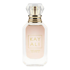 KAYALI Sweet Diamond Pink Pepper compact bottle ready for travel