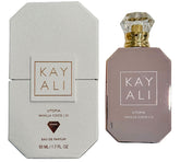 Kayali Utopia Vanilla Coco bottle close-up highlighting tropical notes for confident wear.