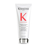 KÉRASTASE Premiere bottle pour showing instant hydration and repair benefits.