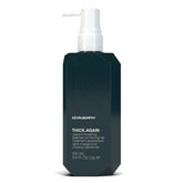 KEVIN.MURPHY THICK.AGAIN bottle closeup for a lightweight treatment for fine, thinning hair