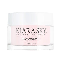 Kiara Sky light pink dip powder bottle swatch for soft classic French tips.