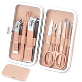 Kidoom manicure set in rose gold case with 9 tools for precise grooming.