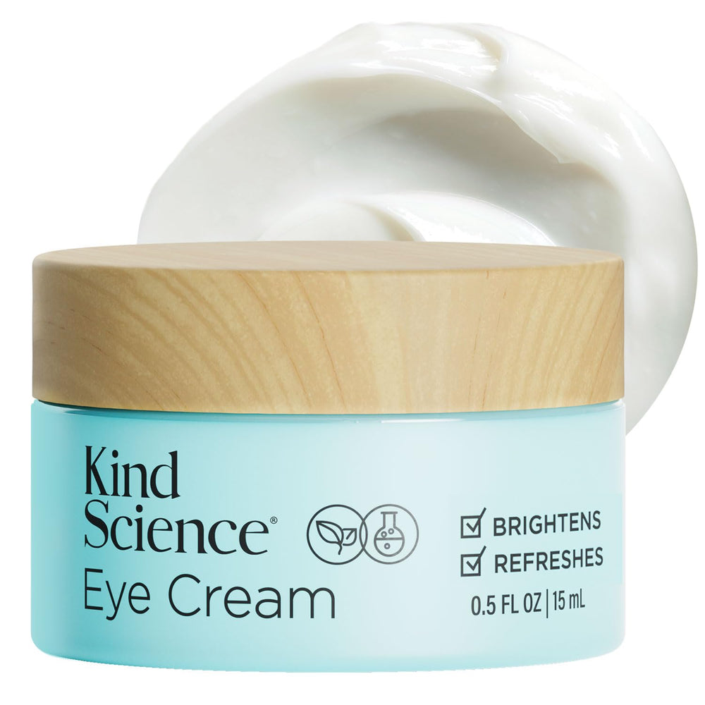 Kind Science Eye Cream tube application smooths the under-eye area.