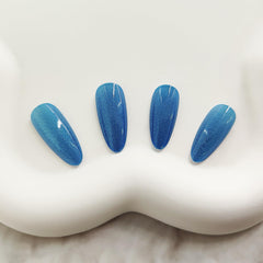 KKUUOO opal-design blue nails sparkle like gemstone.