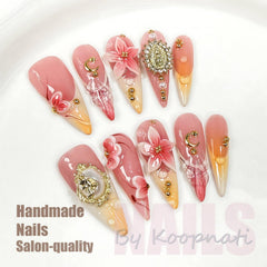 Koopnati nails 3D design detail enhances eye-catching looks.