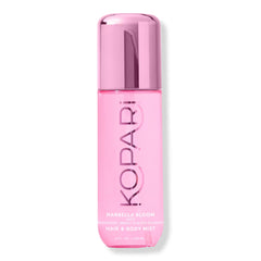 Kopari Marbella Bloom hair mist bottle on vanity for a refreshing aroma.
