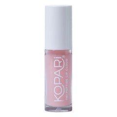 Kopari Tri-Peptide Lip Cloud closeup shows creamy texture delivering lasting hydration.