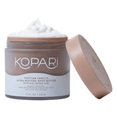 Kopari Ultra Restore Body Butter jar with whipped texture for deep hydration.