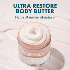Kopari Ultra Restore Body Butter being scooped for quick absorption and nourishment.