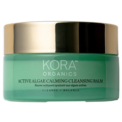 KORA Organics Active Algae Cleansing Balm jar close-up for gentle makeup removal.