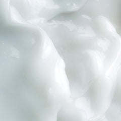 Milky Mushroom mask texture being spread on skin for easy absorption