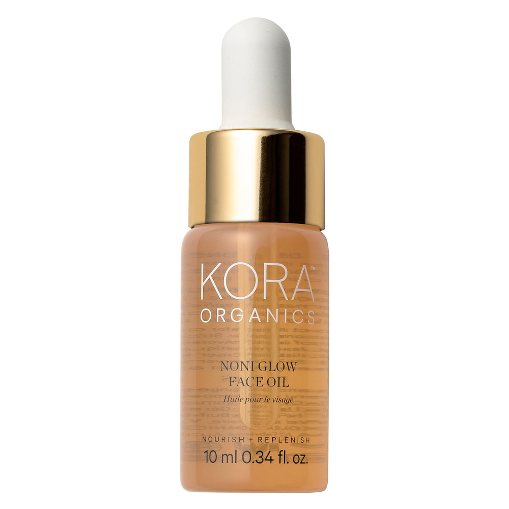 KORA Organics Noni Glow oil bottle delivering hydration for daily rituals.