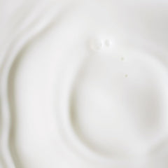 Applying KORA Organics serum for a light, non-greasy finish suitable for day and night.