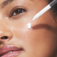 Product in hand illustrating quick absorption and hydration for the skin