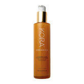 KORA Organics Turmeric Glow Foaming Cleanser packaging highlights sustainability and organic credentials.
