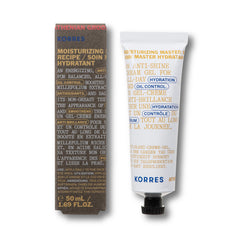 KORRES Athenian Grooming Mattifying Moisturizer texture close-up highlights fast absorption.