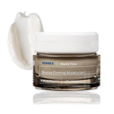 KORRES Black Pine Bounce Moisturizer tube close-up showing smooth, hydrated skin.