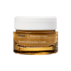 KORRES Black Pine Primus Day Cream texture close-up for hydrated skin.