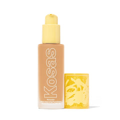 Kosas Revealer foundation bottle close-up shows creamy texture for smooth, natural skin.