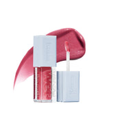 Kosas Wet Lip Oil Gloss bottle closeup highlighting hydrating lip treatment