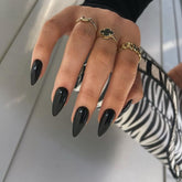 KQueenest All Black press-on nails set in medium almond stiletto for quick application