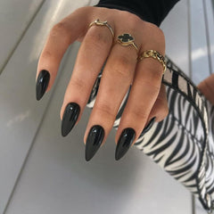KQueenest All Black press-on nails set in medium almond stiletto for quick application