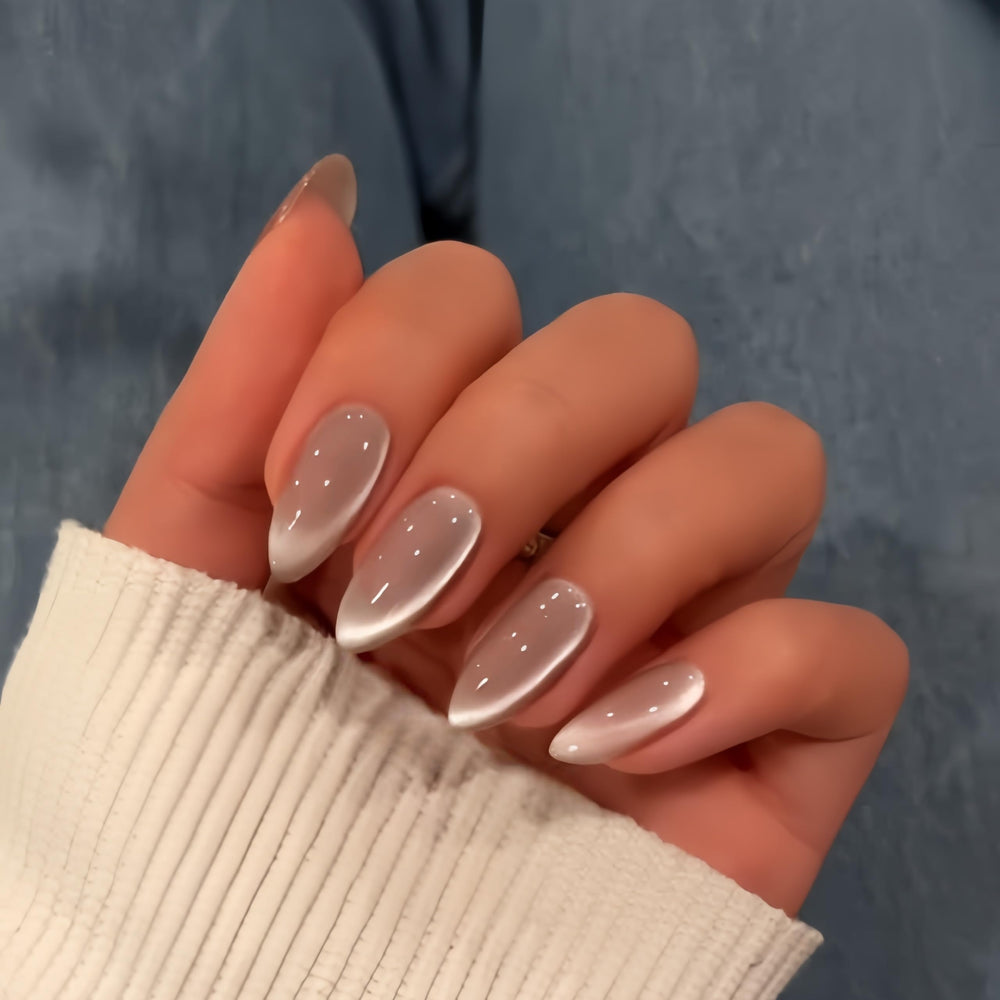 KQueenest cat eye nude pink press-on nails in almond shape for a chic salon look