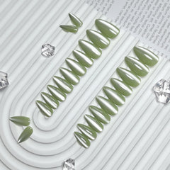 KQueenest Cat Eye Sage Green nails on-hand display highlighting almond shape and bling.
