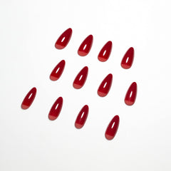 KQueenest glue-on nails during application showing quick, secure fit.