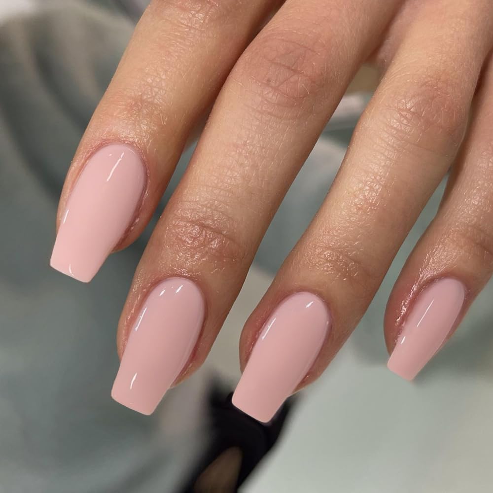 KQueenest light pink press-on nails in medium coffin shape with glossy gel finish