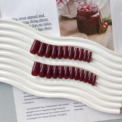 KQueenest wine-red finish nails for bold evening looks and durability.