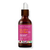 KREYÒL ESSENCE Protect + Shine serum bottle pour for even application and natural shine.