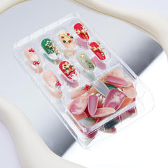 KRTBKR holly and bells design nails for seasonal events.